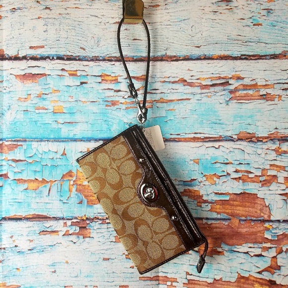 Coach Handbags - coach Penelope signature Zippy wristlet